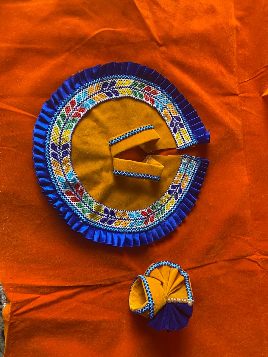 Beaded Laddu Gopal vagha with detailed bead embroidery