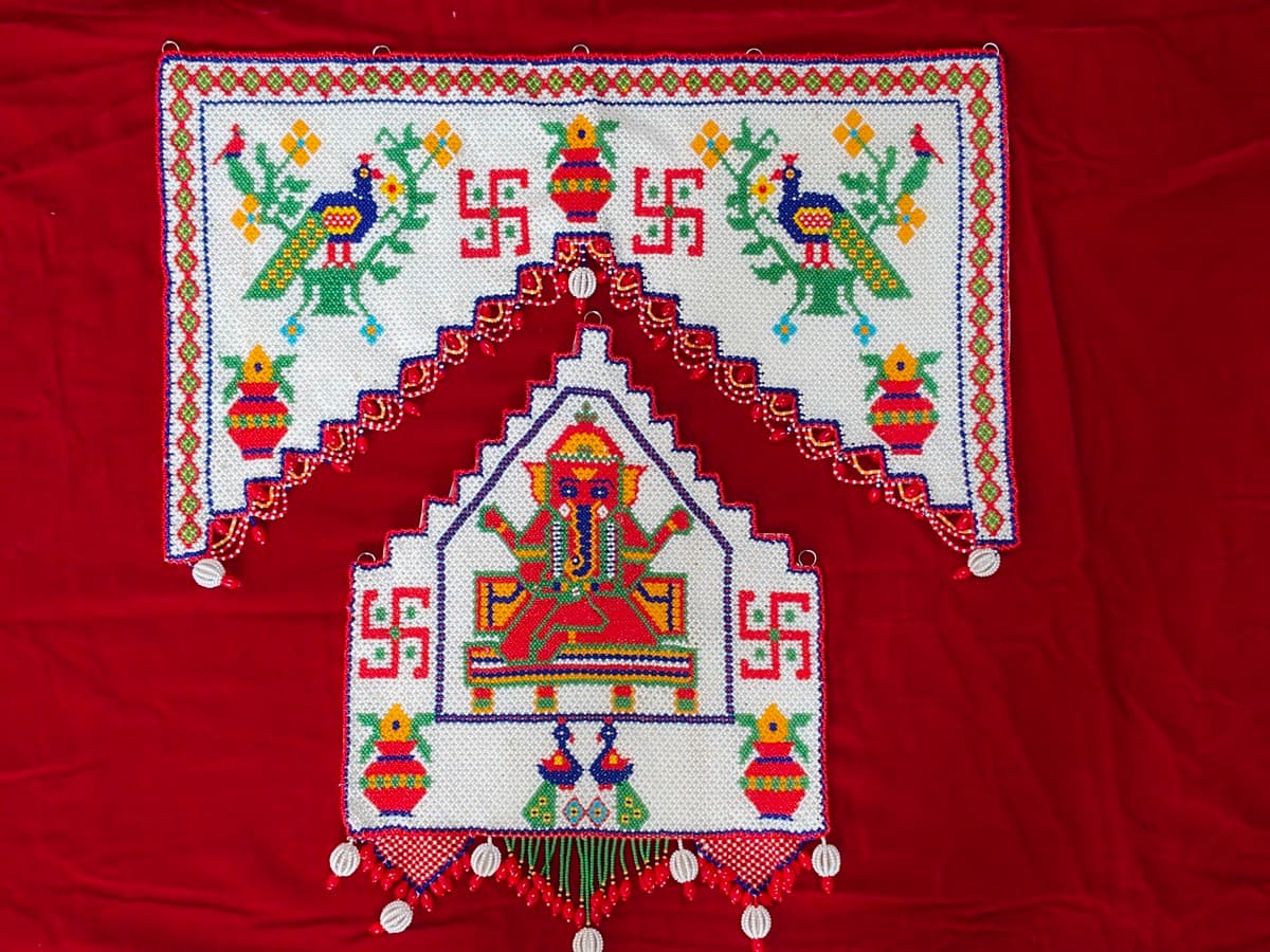 Beaded Ganesh wall hanging with colourful decorative elements